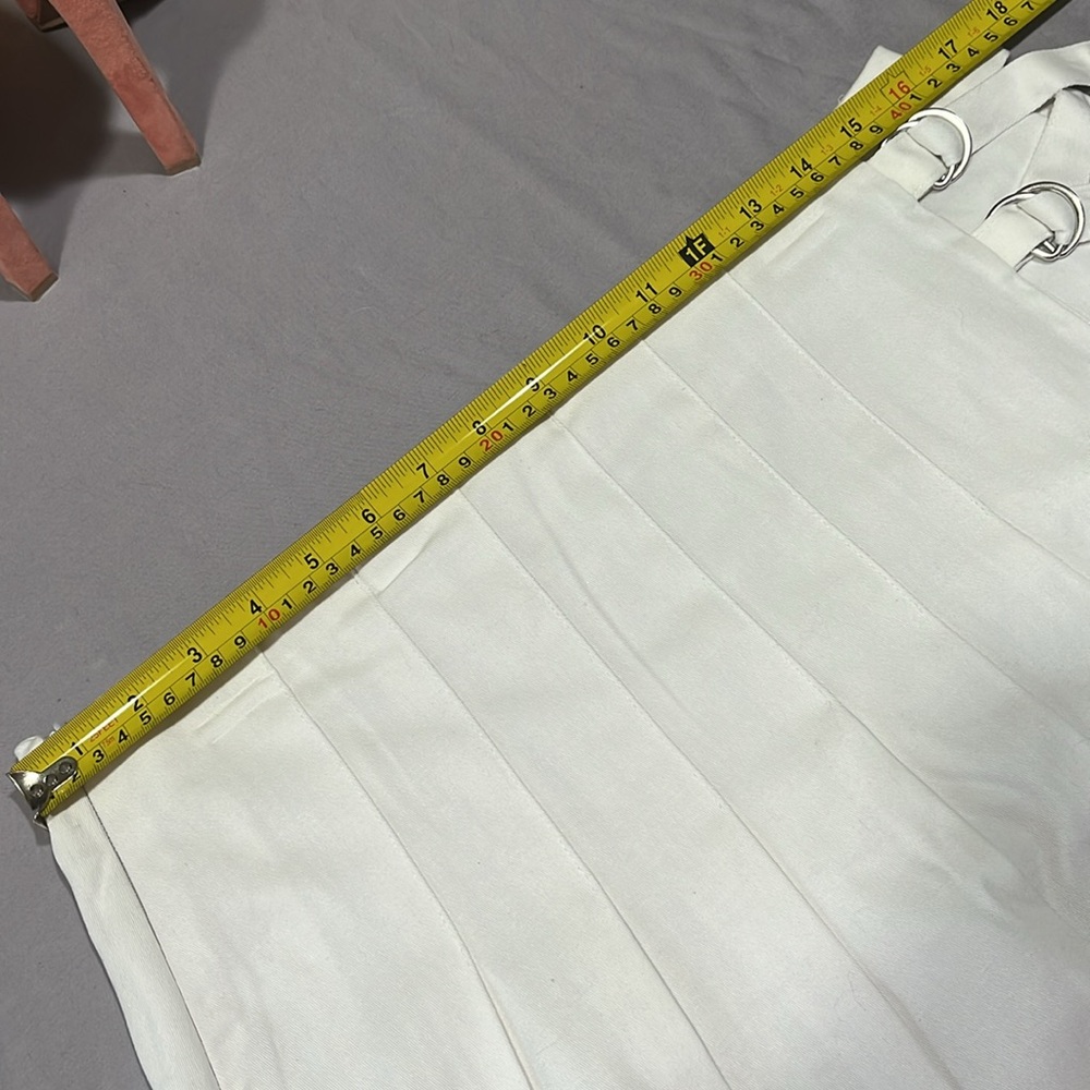 Pleated white mini skirt with no shorts underneath. - Picture 6 of 8